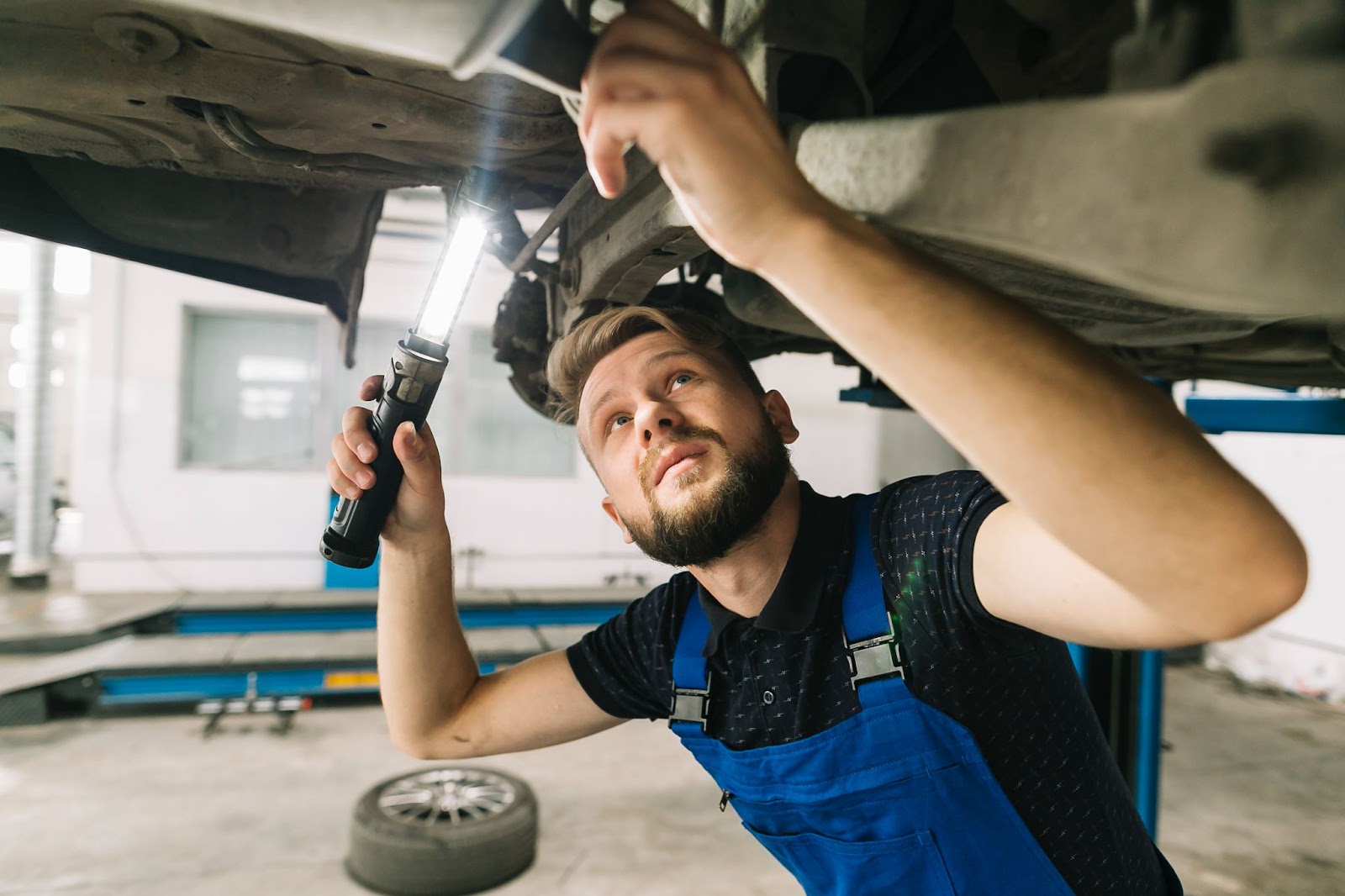 Mechanic Diagnosing Engine Issues